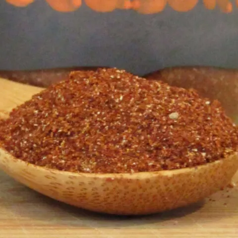 taco seasoning on a wooden spoon