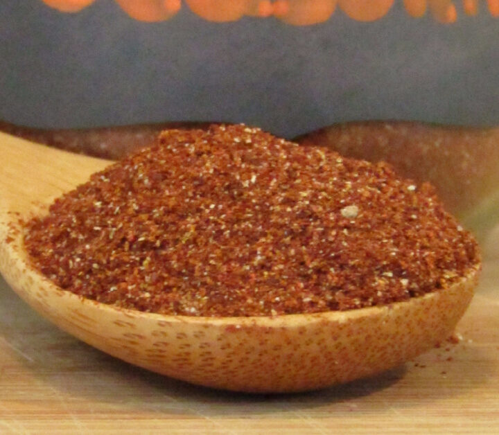 taco seasoning on a wooden spoon