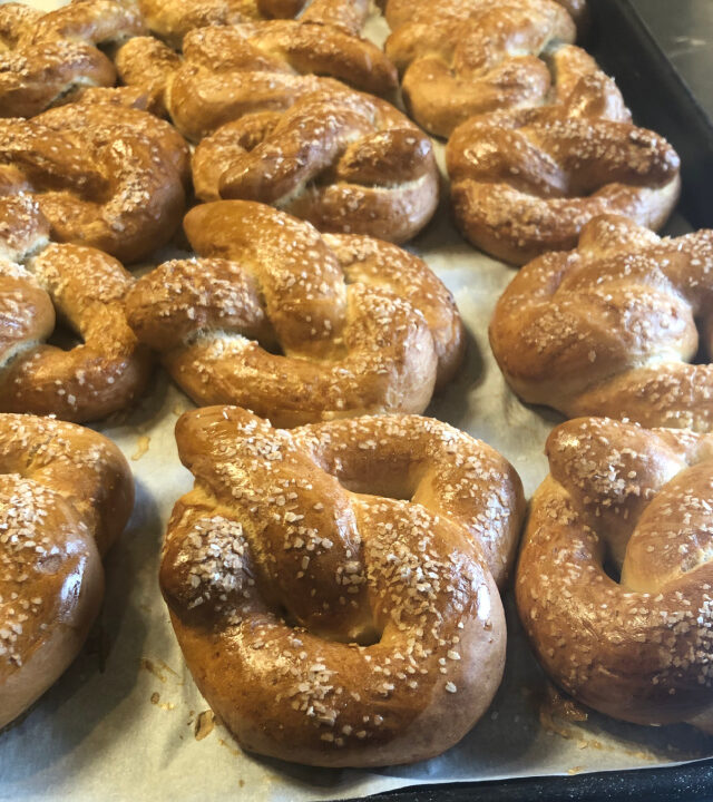 Tray of fresh baked sourdough pretzels