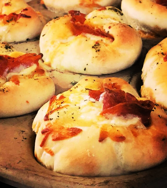 pepperoni pizza rolls fresh baked in a muffin pan